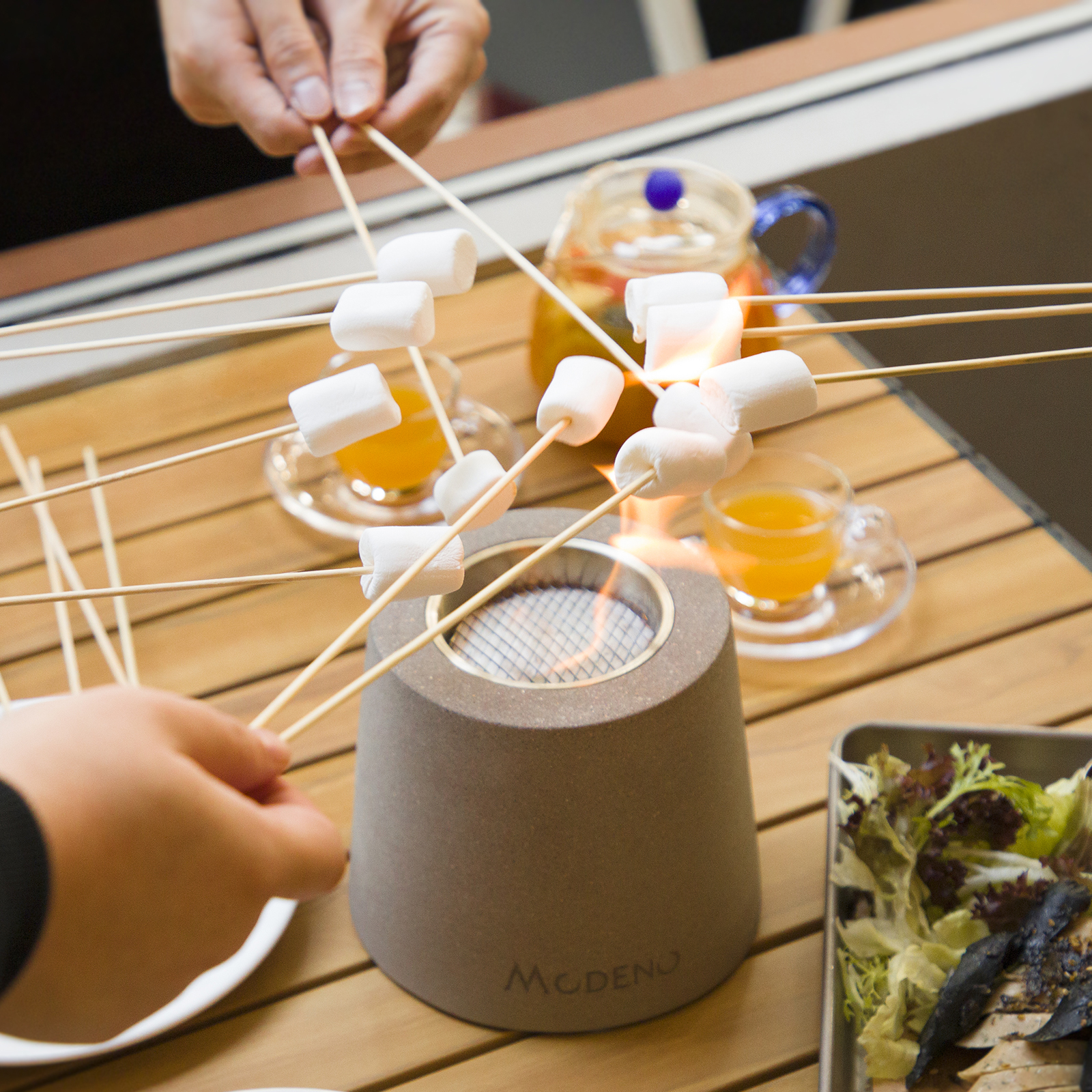 Entta table fireplace made of Beton