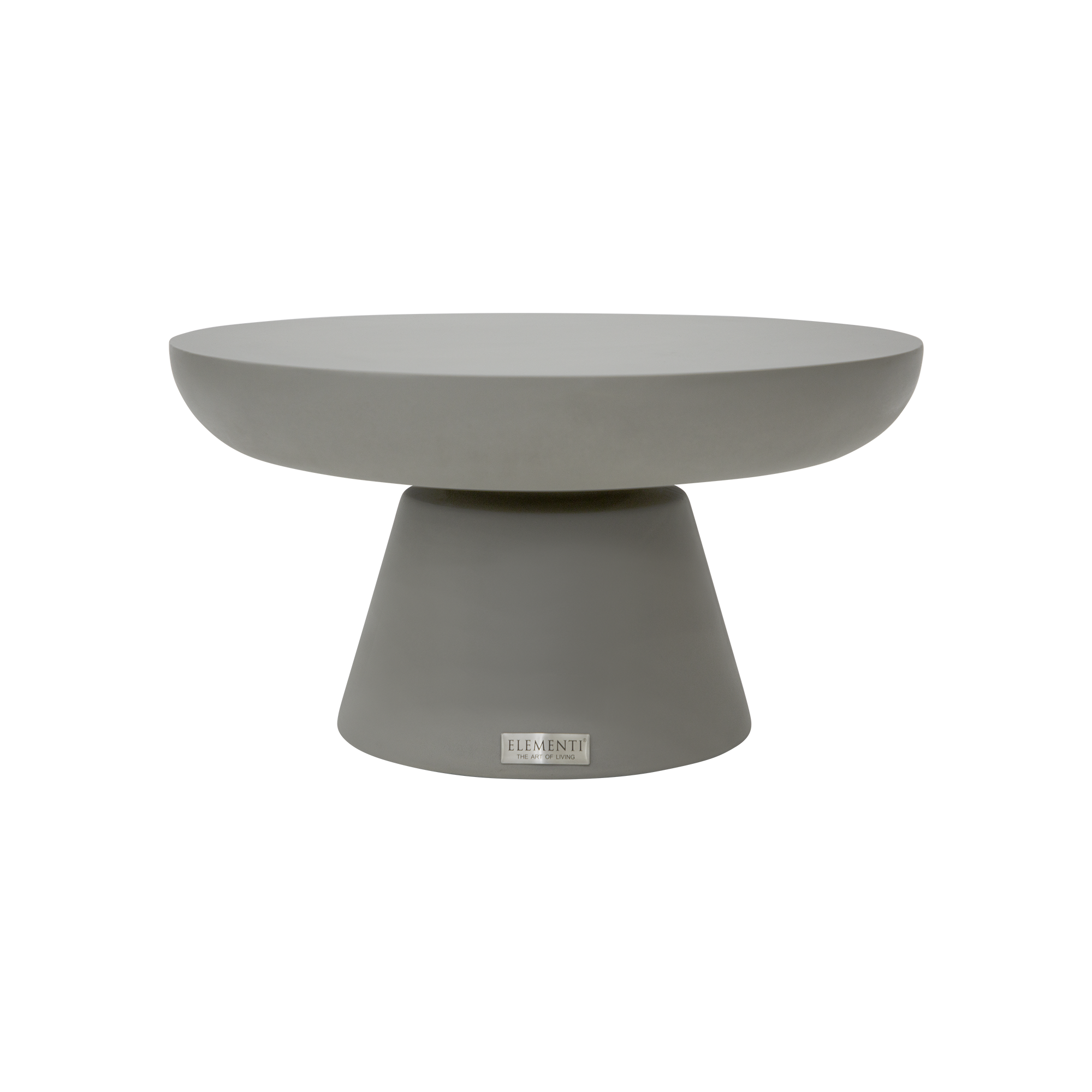 Table en béton dans un intérieur aux teintes claires