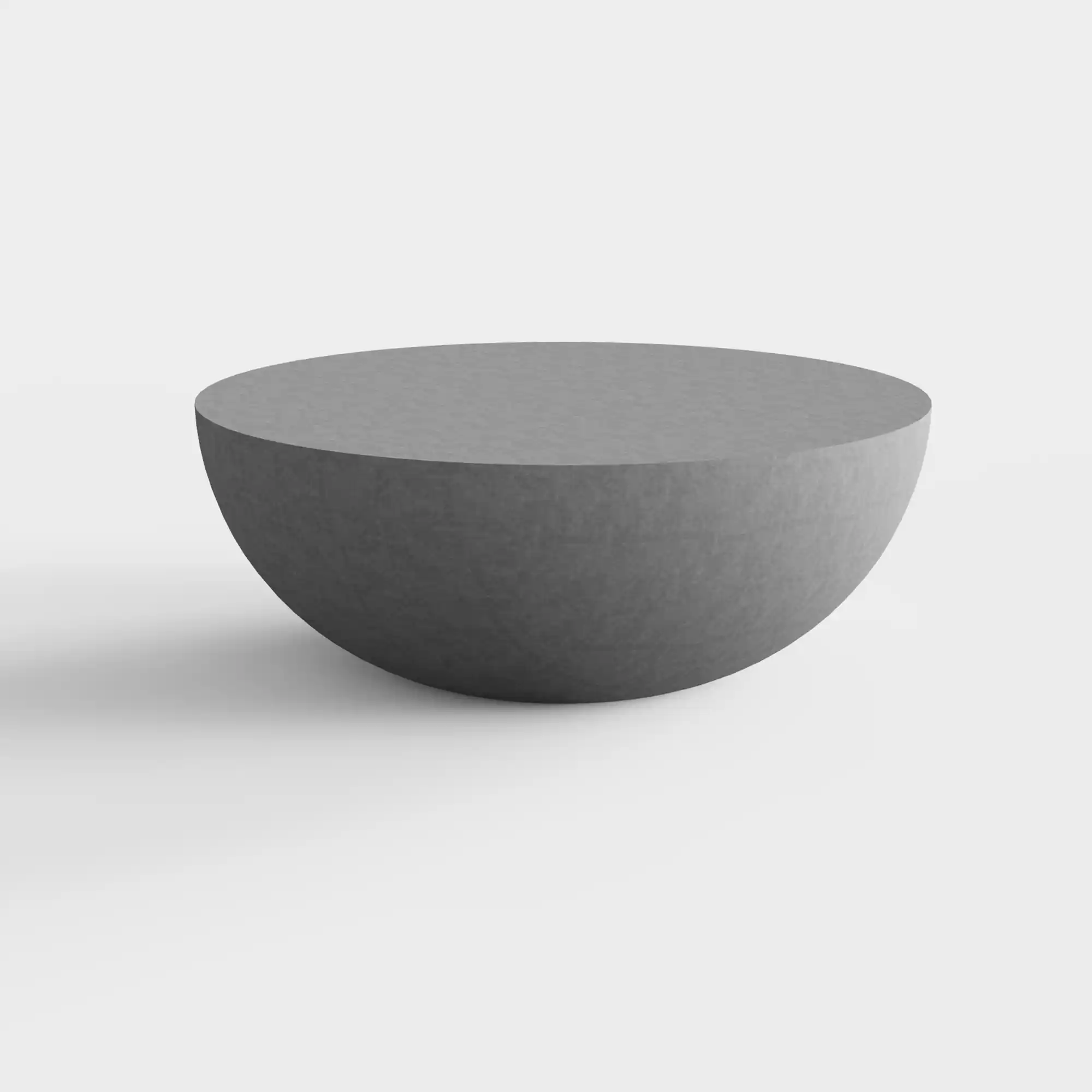 Table ronde d'extérieur en béton sur une terrasse